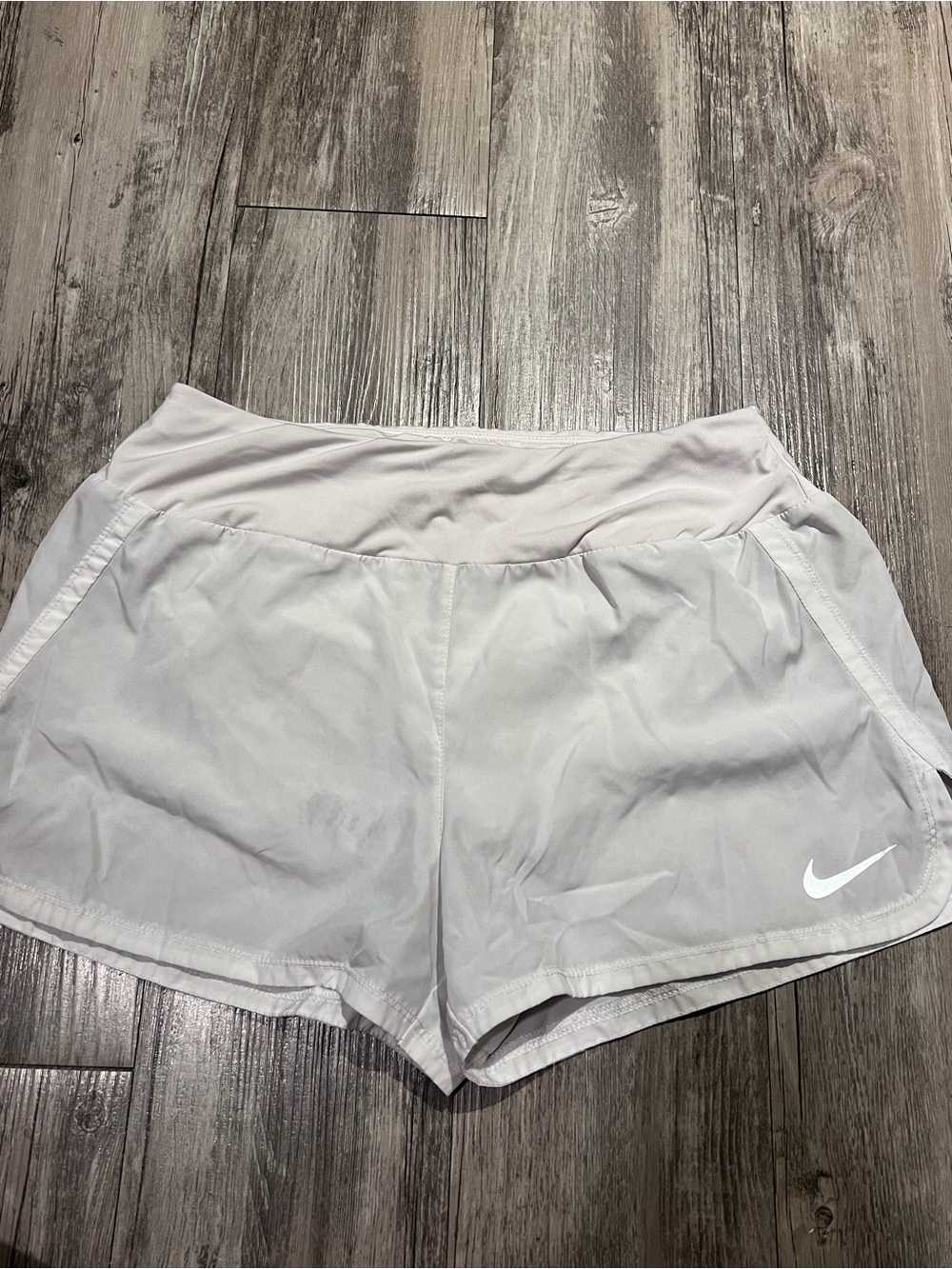 Nike women’s white running shorts Size M